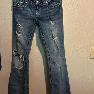 Distressed Blue Jeans